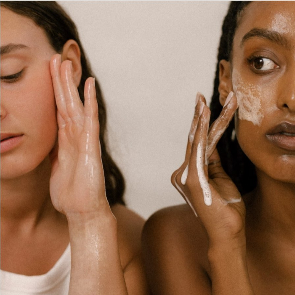two women with face wash